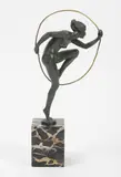 Danseuse au cerceau by Lucien Charles Edouard Alliot, Épreuve en bronze à patine verte, sold Dec 2021