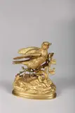 Bécasse tenant une baie dans son bec by Jules Moigniez, Epreuve en bronze doré, sold Mar 2017