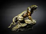 Lionne rugissant by Thomas François Cartier, Epreuve en bronze à patine nuancée signée sur la terrasse, sold Oct 2024