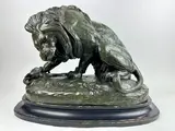 Lion attaquant un serpent by Antoine-Louis Barye, Bronze, patine verte, fonte du XIXe siècle, sold Apr 2024