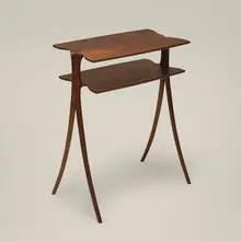 Console table by David Ebner, 1982, walnut, sold Jul 2026