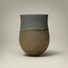 Dark base, haloed speckled band, slate blue top by Jennifer Lee, 1998, hand-built colored stoneware with oxides, sold Jul 2026