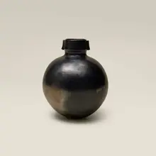 Untitled (Vessel) by Magdalene Odundo, 1983, burnished and carbonised terracotta, sold Jul 2026
