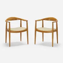 The Chairs, pair by Hans J. Wegner, 1949, oak, fabric, sold Oct 2022