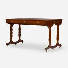 Rare console by Jean-Michel Frank, c. 1940, mahogany, oak, leather with gilding, brass, sold Oct 2022