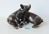Zwei sitzenden Schweine by Kurt Arentz, bronze, sold Dec 2017