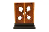 A wooden sculpture by Pino Pedano, print (other), offered Oct 2022