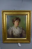 Head and shoulders portrait of a young lady, her hair tied up, wearing white frilled collar over a floral patterned dress by F. Norman, oil, offered Dec 2017