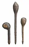 Three Bulbous Headed Clubs by Artefacts And Carvings, early 20th Century carved from hardwood, all of similar form, with old glossy patina, sold Jul 2010