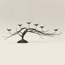 Candelabra by Modern, forged steel with blackened finish, sold Jul 2026