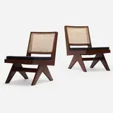 Armless easy chairs from Chandigarh, pair by Pierre Jeanneret, c. 1960, teak, cane, upholstery, sold Oct 2022