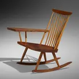 Lounge Rocker with Right Arm by George Nakashima, 1979, American black walnut, hickory, sold Oct 2022