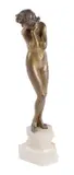 An Art Deco gilt bronze figure of a naked maiden by Claire-Jeanne-Robert Colinet, bronze, offered Jul 2020