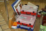 including paints and brushes, together with paper, small drawing board, etc by Five Cases Of Artists Materials, oil, sold Jul 2017