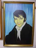Head and shoulders portrait of elvis presley by En Mooney, 1988, oil on canvas, sold May 2017