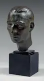 Portrait d'homme by Georges Coulon, 1942, Épreuve en bronze patiné, sold Jun 2015