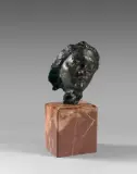 Petite tête au nez retroussé Modèle créé vers 1880 by Auguste Rodin, Épreuve en bronze à patine brun clair, sold Jun 2021