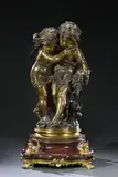 Un couple d'enfants jardiniers by Auguste Moreau, Épreuve en bronze à patine médaille, important socle tournant et contre-socle en bronze et, sold Jun 2023