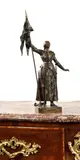 Jeanne d'Arc au drapeau by Oscar Ruffony, Bronze à patine brune nuancée, sold Oct 2024