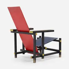 Red Blue chair by Gerrit Rietveld, 1918 / 1951, painted wood, aluminum, sold Oct 2022