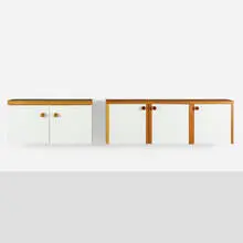 Wall-mounted cabinets, pair by Charlotte Perriand, c. 1968, laminate, pine, sold Aug 2022