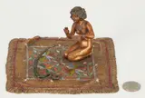 Woman & Snake Rug by Franz Xavier Bergmann, bronze, sold Oct 2022