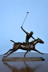 A patinated bronze group of a polo player and pony by Phyllida Meacham, 1990, bronze, sold Nov 2019