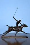A patinated bronze group of a polo player and pony by Phyllida Meacham, 1990, bronze, sold Nov 2019