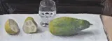 Cucumber with a glass Oil on board Signed and dated73 upper right 11 x 29.5cm (4¼ x 11½ in.) Executed in 1973 by Richard Eurich, 1973, Oil on board, sold Oct 2019
