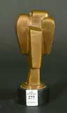 Austrian, An abstract bronze on a slate plinth by Willi Scukop, bronze, sold Nov 2022