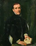 British, Portrait of a gentleman standing with his hands holding open a book, thought to be the British actor, Leslie Richard French (1904-1999) by Charles Mendelssohn Horsfall, oil on canvas, sold Oct 2022