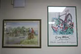 approximately 65.5cm x 47.5cm, together with Douglas E West Cycling print, approximately 36cm x 53cm (2) by Guy Weir Aquarelliste Framed Poster, print, sold Dec 2016