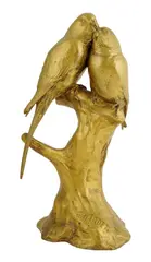 A gilt bronze model of two parakeets standing on a stump, the base signed 'G by Georges Gardet, bronze, sold Jan 2016