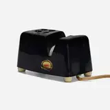 Carvel Hall knife sharpener by George Nelson & Associates, 1955-56, plastic, enameled steel, sold Aug 2022