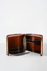 Bar mobile - Modèle B106 dit 'Jamaica' by Eugenio Gerli, Bois lamellé-collé, bois laqué et acier, sold Dec 2025