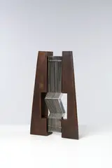 Cuneo by Alberto Biasi, 2002, Bronze sculpté à patine brune et aluminium, sold Dec 2025