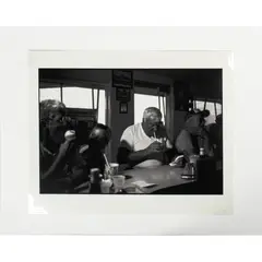 Man At Diner Counter by Tom Bamberger, 1988, gelatin silver print, sold Dec 2023