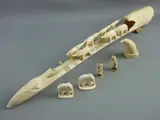 Including an elephant train tusk with alligator ends by Carved Ivory Ornaments, sculpture, sold Jun 2017