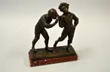 a patinated bronze figural study, two boys smoking, inscribed 'As tu du feu?' set on red rectangular marble plinth, approximately 19.5cm x 7.5cm x 24.5cm high by H. Fugere, bronze, sold Feb 2016