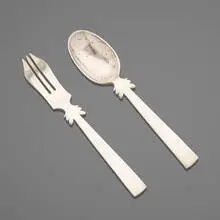 Serving utensils, pair by William Philip Spratling, c. 1945, sterling silver, sold Aug 2022