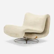Lounge chair by Modern, c. 1960, chrome-plated steel, faux fur, sold Aug 2022