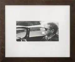 Steve McQueen in his 1957 Jaguar XKSS Driving Through Nichols Canyon in Hollywood by Sid Avery, 1960, Photograph, sold Jun 2025