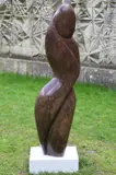 The Mystic Woman Carved French Purple Schist 156 cm high, 46 cm wide, 32 cm deep On view at: The Sculpture Park by Emmanuel Changunda, Carved French Purple Schist, offered Jul 2019