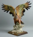 the large figure in animated pose with by Guiseppe Armani Eagle Sculpted For Capodimonte, sculpture, offered May 2017