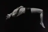 Monochrome print - study of a gymnast in mid-air entitled ' by Harry Holland limited edition, 1977, print, sold May 2017