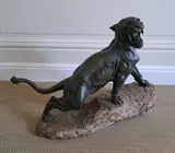 Lionne rugissant by Thomas François Cartier, Bronze à patine verte, socle en marbre, sold Sep 2024