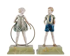 Sonny Boy and Hoop Girl, two Art Deco cold painted bronze and ivory figures, on green onyx bases, engraved signatures F by Ferdinand Preiss, bronze and ivory, sold Apr 2019