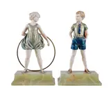 Sonny Boy and Hoop Girl, two Art Deco cold painted bronze and ivory figures, on green onyx bases, engraved signatures F by Ferdinand Preiss, bronze and ivory, sold Apr 2019