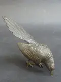 a cold painted bronze figure of a cuckoo bird, modelled standing with by Franz Bergman, bronze, sold Mar 2015