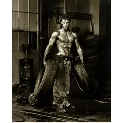 Fred with Tires by Herb Ritts, gelatin silver print, sold Aug 2024